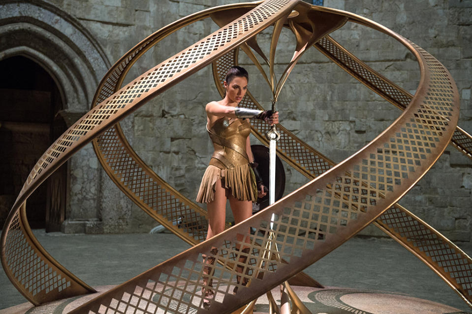 <p>Diana (Gal Gadot) enters Themyscira’s inner sanctum to retrieve the magical shield and the blade, both forged by Hephaeastus. The sword was a gift from Zeus to the Amazons and, as its name suggests, has the power to take down a god. (Photo: Warner Bros.) </p>