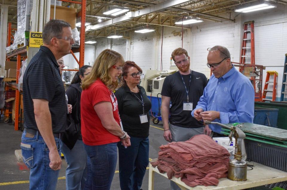 Dan Stott, president and owner of Port Clinton Manufacturing Company, took six local teachers on a tour of the business as part of Ottawa County Teacher Business Boot Camp 2023.