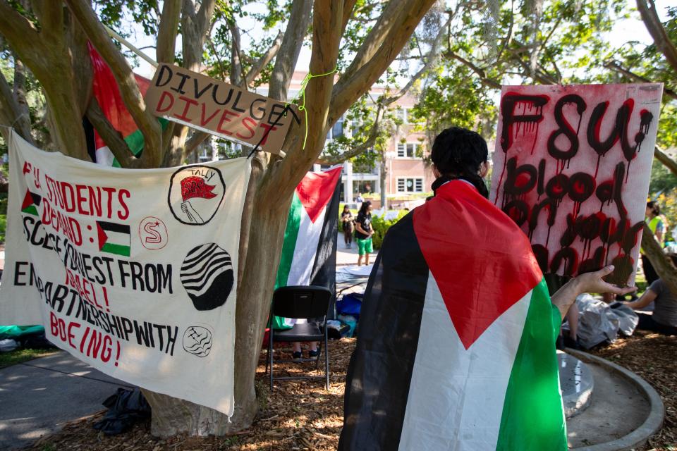 A small crowd of roughly 40 gathered outside the Strozier library on the Florida State University campus to rally in solidarity with Gaza as Israeli-Palestinian conflicts continue Thursday, April 25, 2024.