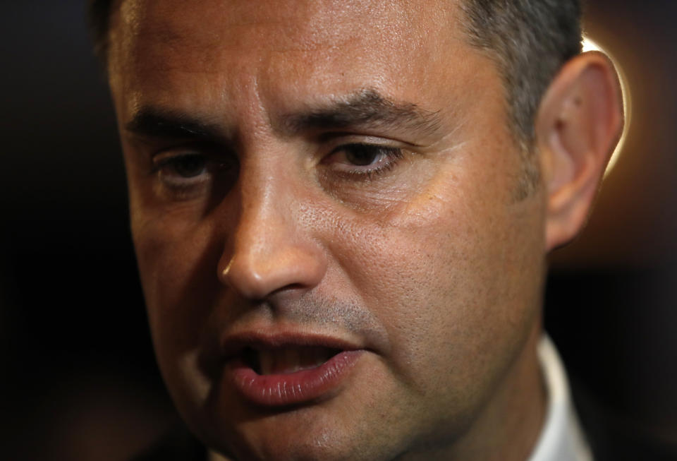 Conservative independent candidate Peter Marki-Zay talks with the media in Budapest, Hungary, Sunday, Oct. 17, 2021, after he won an opposition primary race in Hungary, making him nominee of a six-party opposition coalition who will lead a challenge to right-wing populist Prime Minister Viktor Orban in national elections next spring . (AP Photo/Laszlo Balogh)