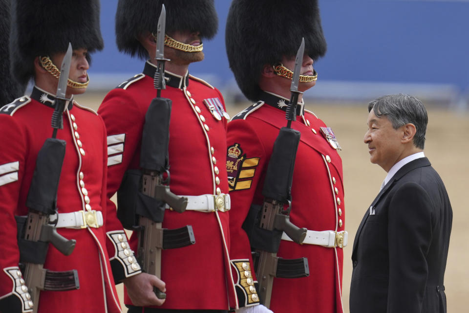 FILE - Japan's Emperor Naruhito inspects the honour guard on Horse Guards parade during the ceremonial welcome for start of the State Visit to Britain by the Japanese Emperor and Empress, in London, Tuesday, June 25, 2024. Naruhito and the Empress Masako, who studied at Oxford a few years after her husband, wrapped up a weeklong trip to Britain on Friday. Their itinerary combined the glitter and ceremony of a state visit with four days of less formal events that gave the royal couple an opportunity to revisit their personal connections to Britain. (AP Photo/Kin Cheung, Pool, File)
