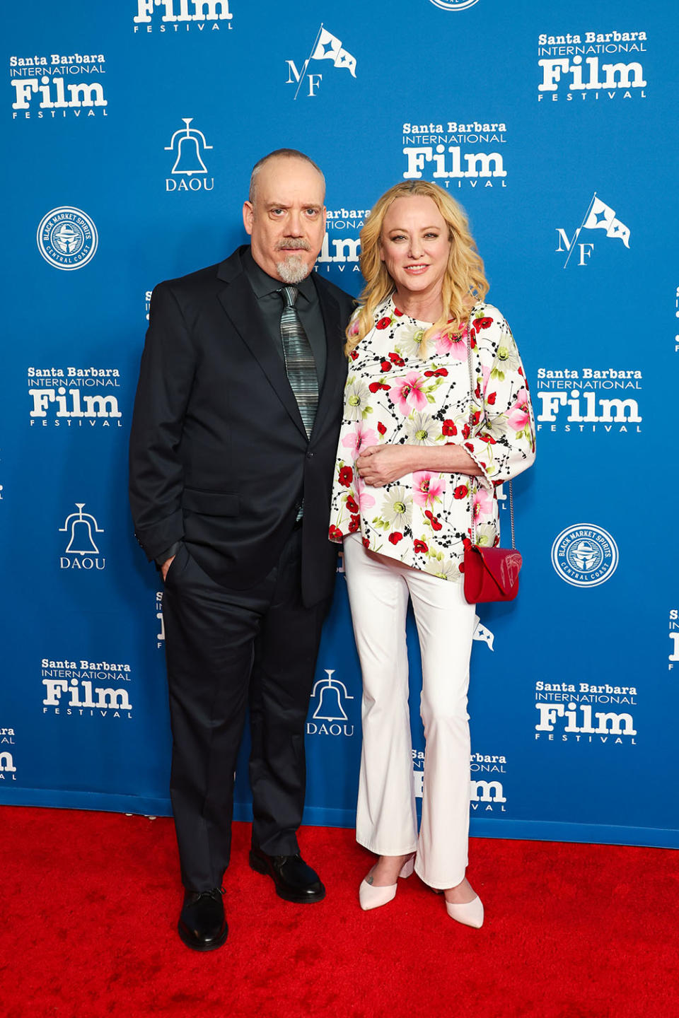Honoree Paul Giamatti and Virginia Madsen attend the 39th Annual Santa Barbara International Film Festival: Cinema Vanguard Award honoring Paul Giamatti at The Arlington Theatre on February 14, 2024 in Santa Barbara, California
