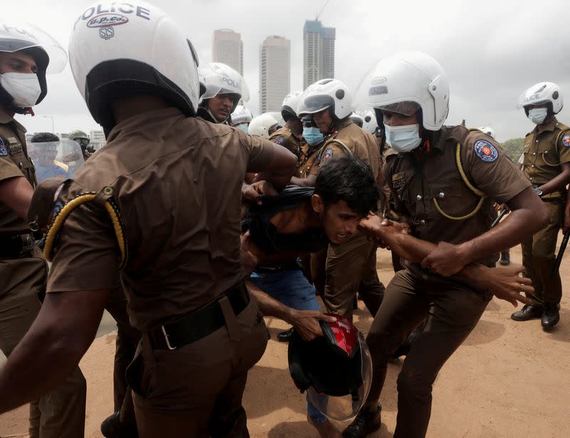FILE PHOTO: Sri Lanka's ruling party supporters storm anti-government protest camp, at least 9 injured, in Colombo