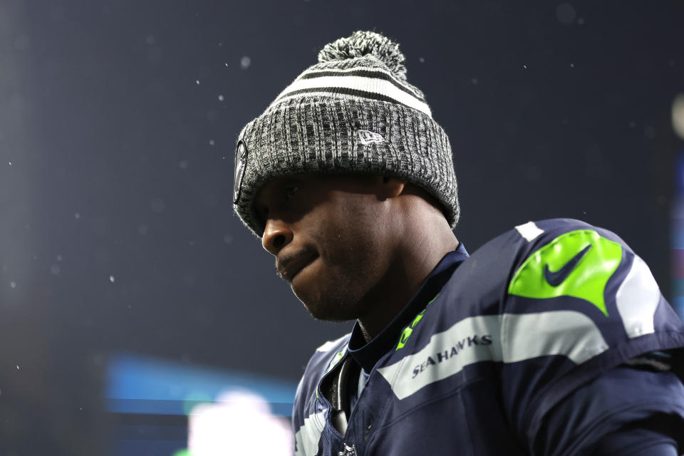 SEATTLE, WASHINGTON – DECEMBER 18: Geno Smith #7 of the Seattle Seahawks looks on before a game against the Philadelphia Eagles at Lumen Field on December 18, 2023 in Seattle, Washington. (Photo by Steph Chambers/Getty Images)
