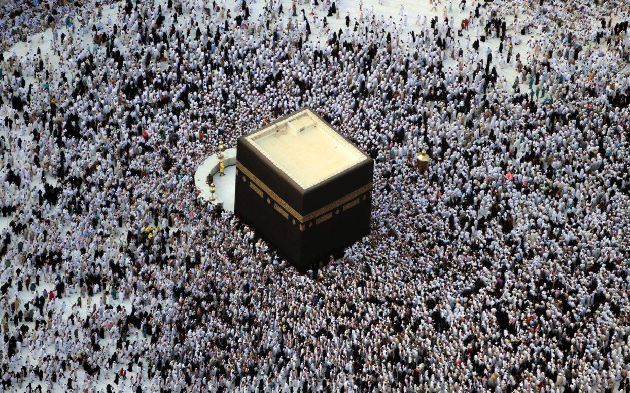 Four Britons have died after the coach they were travelling on from Mecca to Medina as part of an Umra pilgrimage crashed - AFP