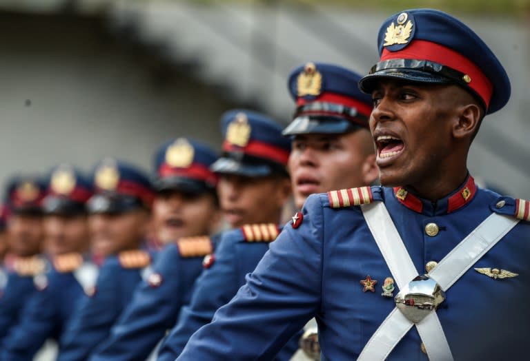 Members of Venezuela's army parade during a military honor ceremony for re-elected Venezuelan President Nicolas Maduro