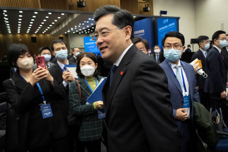 Chinese Foreign Minister Qin Gang walks after delivering a keynote speech during the "Lanting Forum" in Beijing