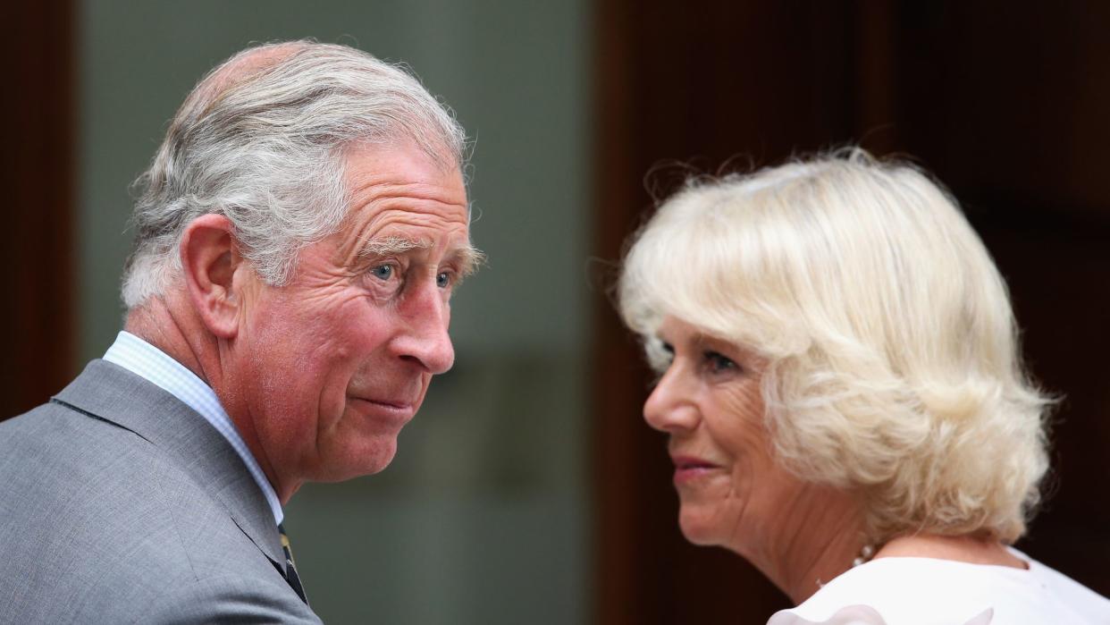 king charles and queen camilla smiling 