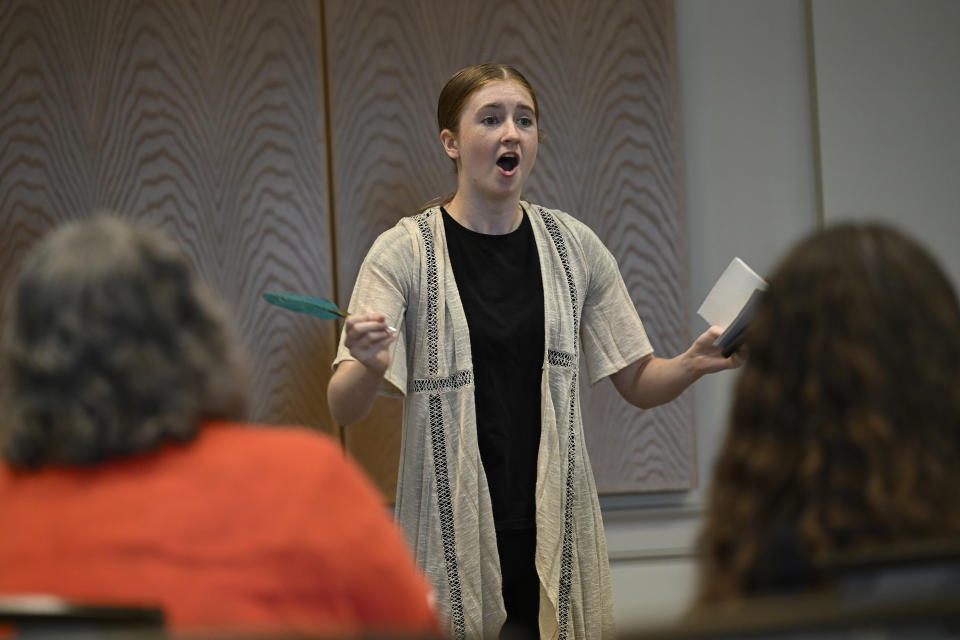 Macy Huish, a high school student from Logan, Utah, performs a one-woman show about Elizabeth Packard, a nineteenth-century advocate for women's rights and the mentally ill, for judges at a National History Day competition at the University of Maryland, Tuesday, June 11, 2024 in College Park, Md.. (AP Photo/John McDonnell)