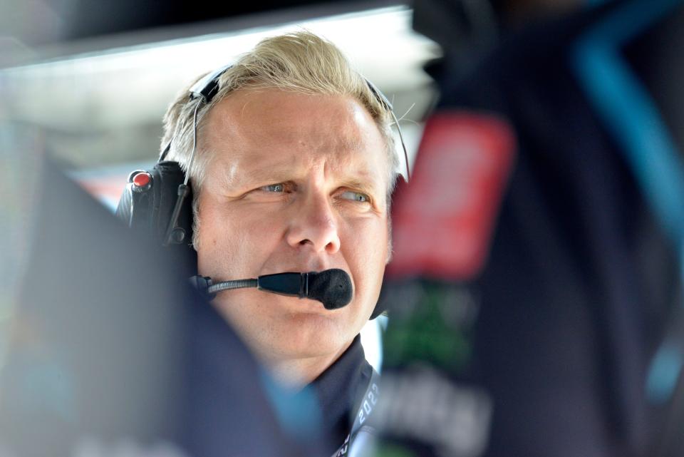 Ed Carpenter stands in a pit box Friday, July 29, 2022, during qualifying for the Gallagher Grand Prix at Indianapolis Motor Speedway.