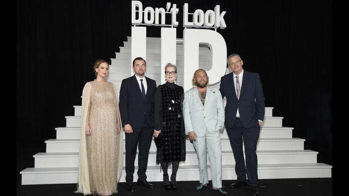 Jennifer Lawrence, left, Leonardo DiCaprio, Meryl Streep, Jonah Hill and Adam McKay pose together at the world premiere of 