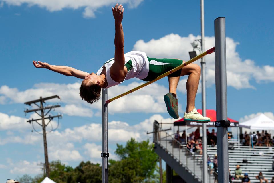 Fossil Ridge's Luke Garvin attempts to clear the bar at the boys 5A high jump during the Colorado track and field state championships on Friday, May 17, 2024 at Jeffco Stadium in Lakewood, Colo.