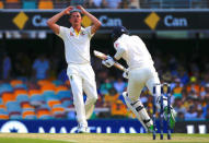 Cricket - Ashes test match - Australia v England - GABBA Ground, Brisbane, Australia, November 23, 2017. England's James Vince hits a boundary as Australia's Josh Hazlewood reacts during the first day of the first Ashes cricket test match. REUTERS/David Gray