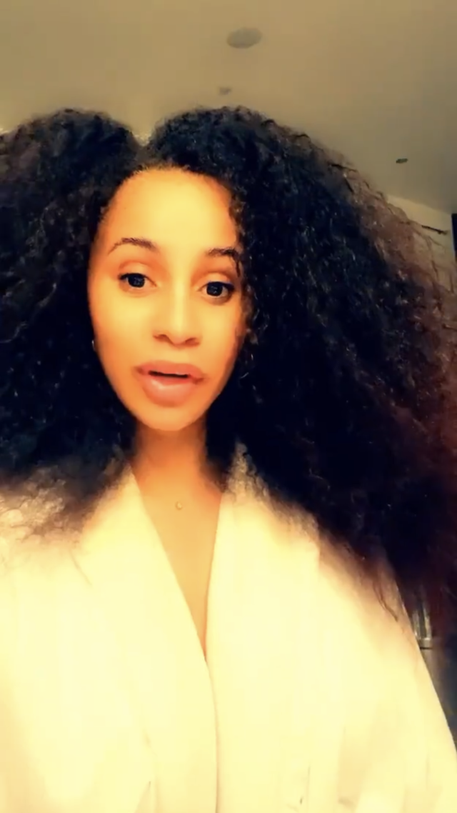 ariana grande curly black hair