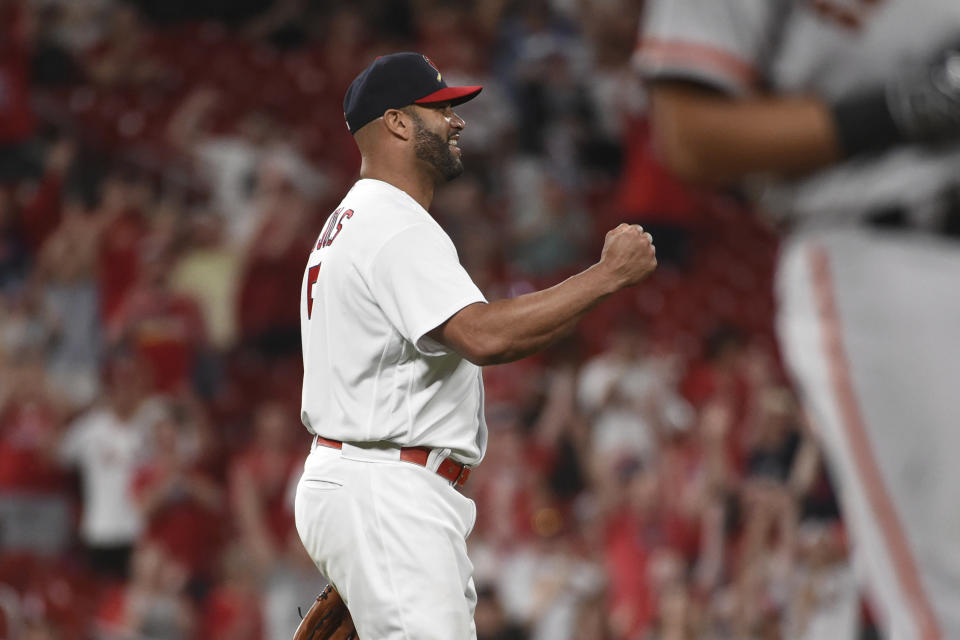 St. Louis Cardinals relief pitcher Albert Pujols (5) reacts after beating the San Francisco Giants 15-6 after a baseball game on Sunday, May 15, 2022, in St. Louis. (AP Photo/Joe Puetz)