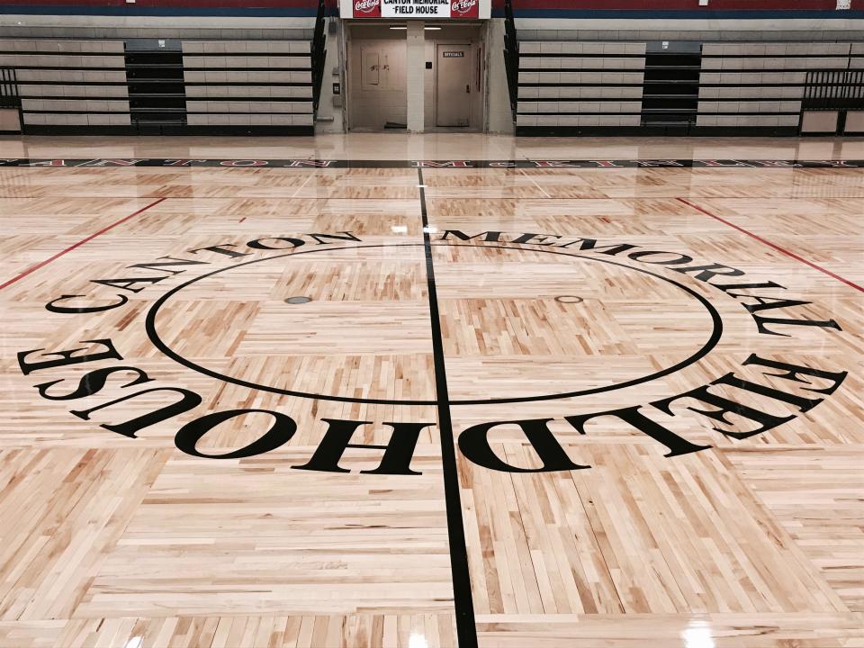 The floor at the Canton Memorial Field House in 2017 after it was redesigned and refurbished. It kept its traditional Field House insignia at center court. (Submitted photo)