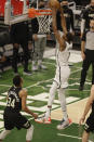 Brooklyn Nets forward Kevin Durant (7) dunks in front of Milwaukee Bucks forward Giannis Antetokounmpo (34) during the first half of Game 6 of a second-round NBA basketball playoff series Thursday, June 17, 2021, in Milwaukee. (AP Photo/Jeffrey Phelps)