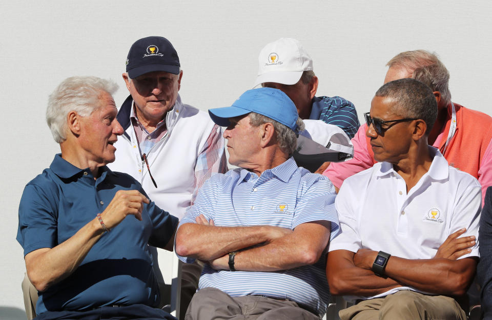 As Clinton chats, Bush and Obama are among those listening. (Photo: Sam Greenwood via Getty Images)