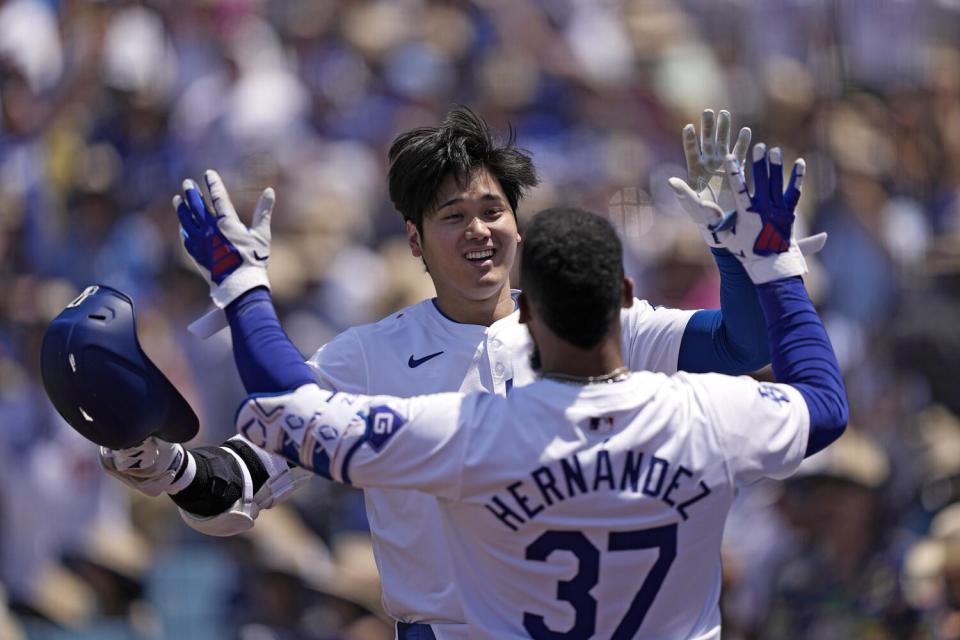 Shohei Ohtani, left, and Teoscar Hernández will figure prominently in the lineup that will be missing Mookie Betts.