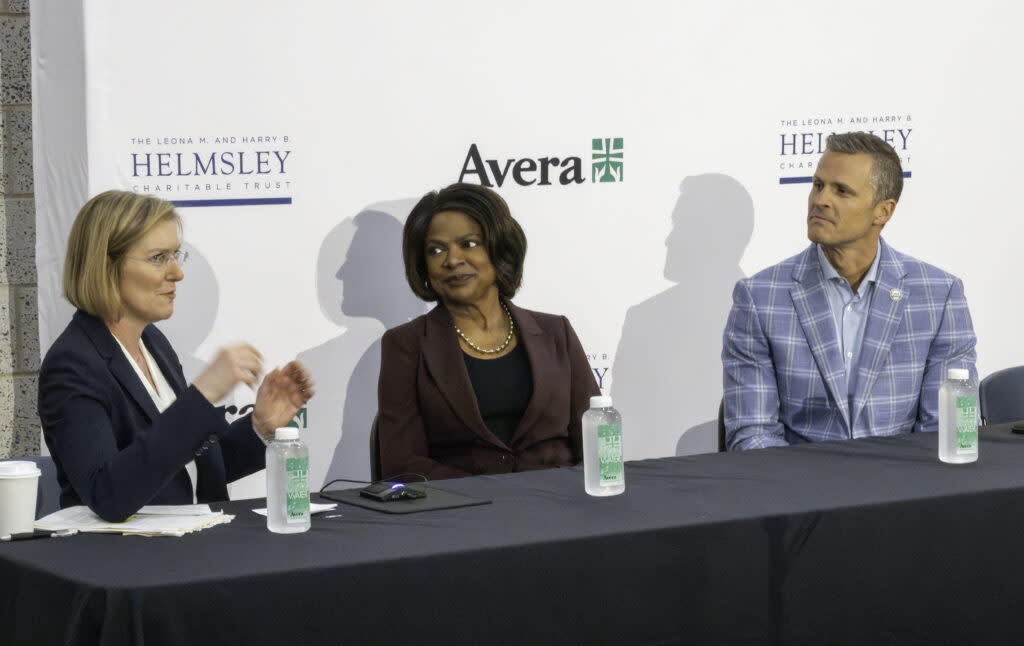 From left, panel moderator and chief rural health correspondent with KFF Health News, Sarah Jane Tribble, asks questions of Democratic former U.S. representative from Florida, Val Demings, and Sioux Falls Mayor Paul TenHaken during a youth mental health crisis discussion on April 26, 2024, in Sioux Falls. (Courtesy of Dirk Lammers)