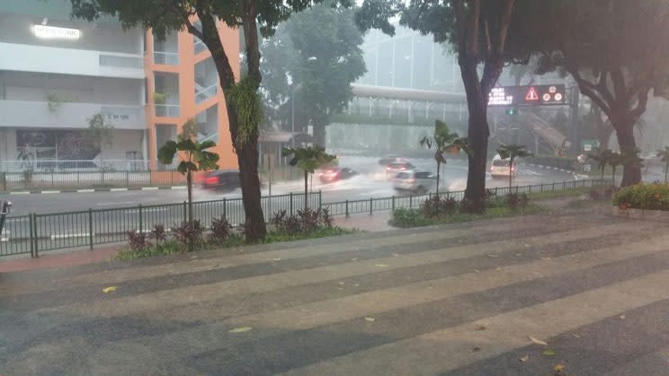 Heavy downpour at Upper Cross Street on 23 January 2017. (Photo: Safhras Khan)