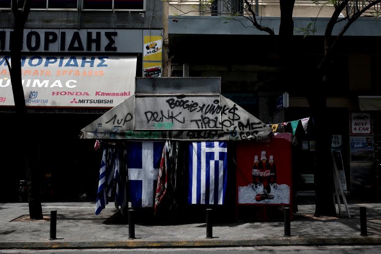 Greece bought time in debt crisis negotiations with official creditors when it moved to bundle four looming IMF loan payments into one, to be paid by the end of June