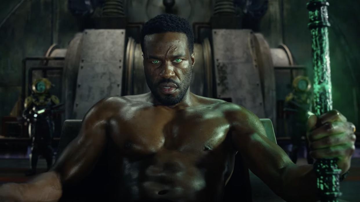  Yahya Abdul-Mateen II as Black Manta holding Black Trident in Aquaman and the Lost Kingdom. 