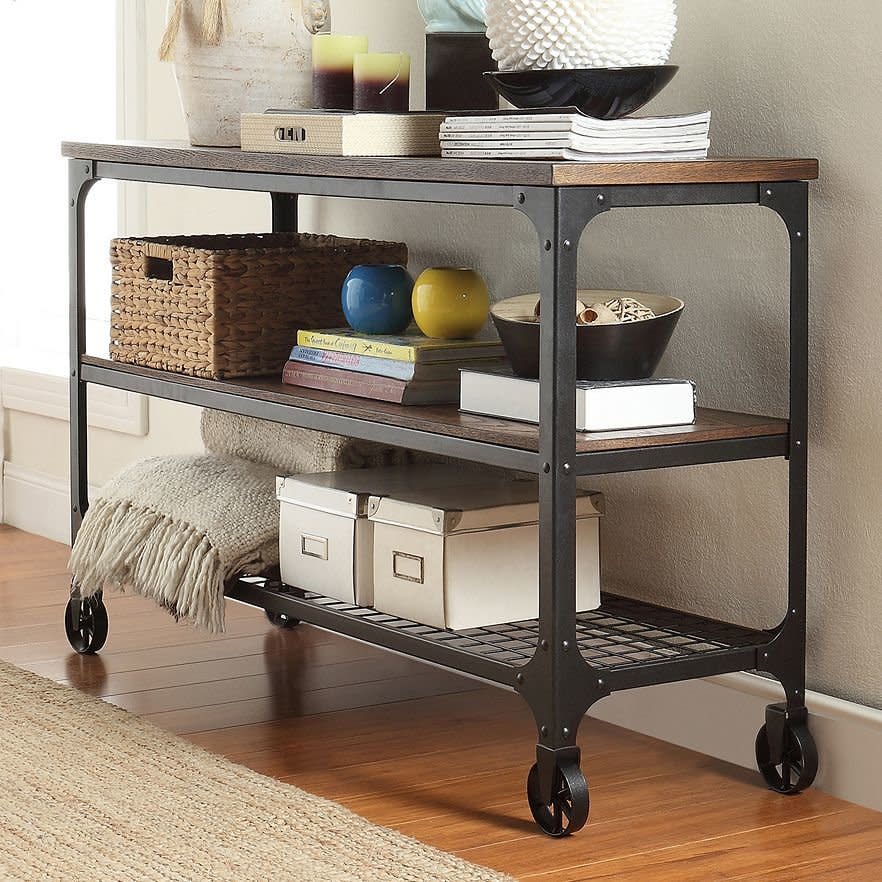 Roller Console Table, $339.99 at <a href="http://www.kohls.com/product/prd-1820454/homevance-comerford-console-table.jsp?color=Brown" target="_blank">Kohl's</a>