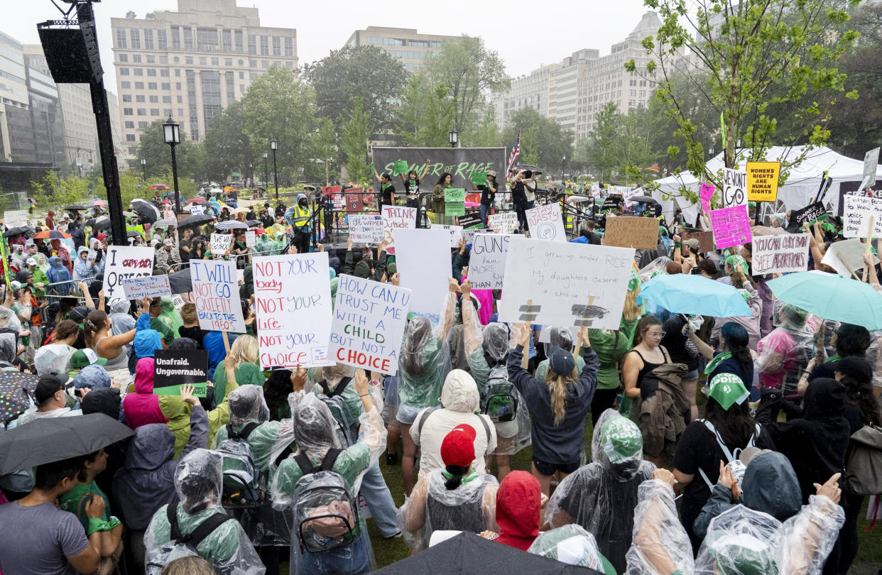 Abortion rights demonstrators gather in Franklin Square Park (Gemunu Amarasinghe / AP)