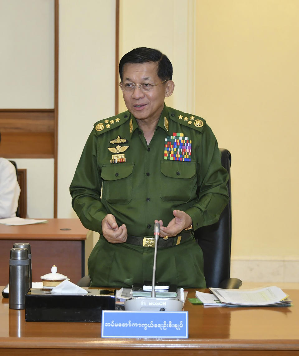 In this photo released from the The Military True News Information Team on Nov. 8, 2023, Senior Gen. Min Aung Hlaing, chairman of State Administration Council, speaks during a meeting with members the National Defense and Security Council in Naypyitaw, Myanmar. The head of Myanmar’s military government has charged that a major offensive in the country’s northeast by an alliance of armed ethnic minority organizations was funded in part by profits earned by one of the groups from the region's lucrative drug trade, state-controlled media reported Thursday. (The Military True News Information Team via AP)
