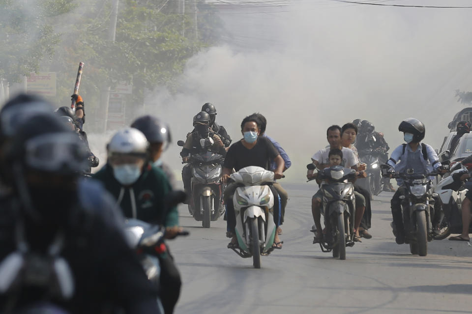 Protesters drive their motorcycles during an anti-coup protest in Mandalay, Myanmar on Thursday March 25, 2021. Protesters against last month's military takeover in Myanmar returned to the streets in large numbers Thursday, a day after staging a "silence strike" in which people were urged to stay home and businesses to close for the day. (AP Photo)