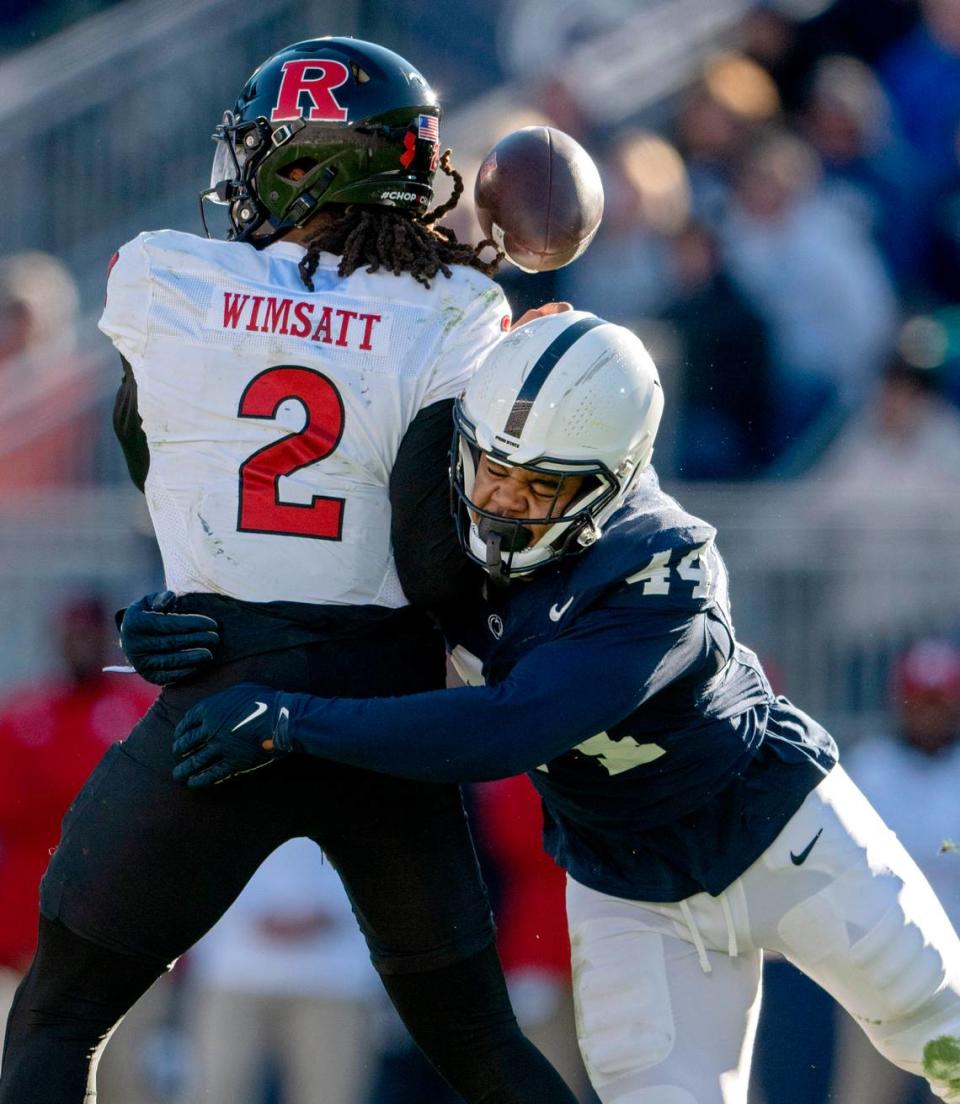 The ball pops away from Rutgers quarterback Gavin Wimsatt as he is sacked by Penn State defensive end Chop Robinson during the game on Saturday, Nov. 18, 2023. Abby Drey/adrey@centredaily.com