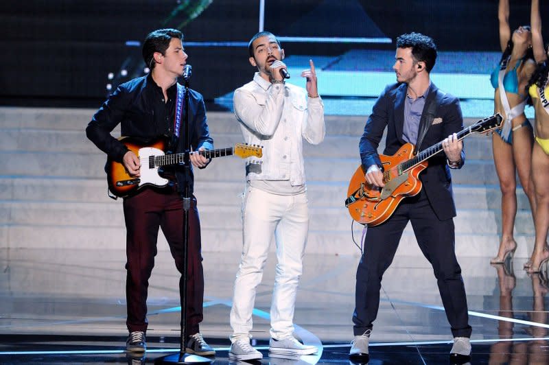 Jonas Brothers perform at the Miss USA pageant in 2013. File Photo by David Becker/UPI