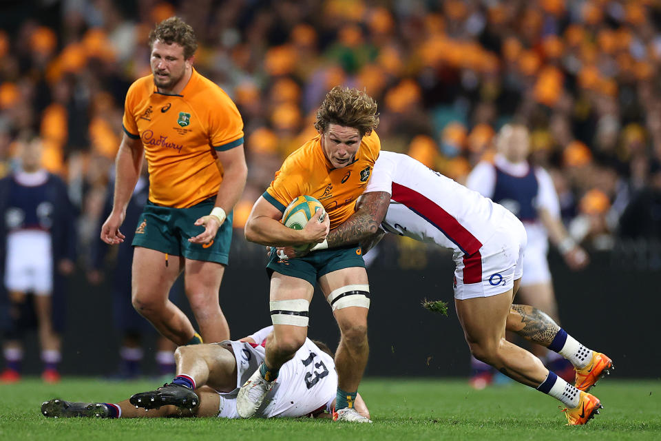 Pictured here, Wallabies captain Michael Hooper is tackled during the third Test against England at the SCG in 2022. 