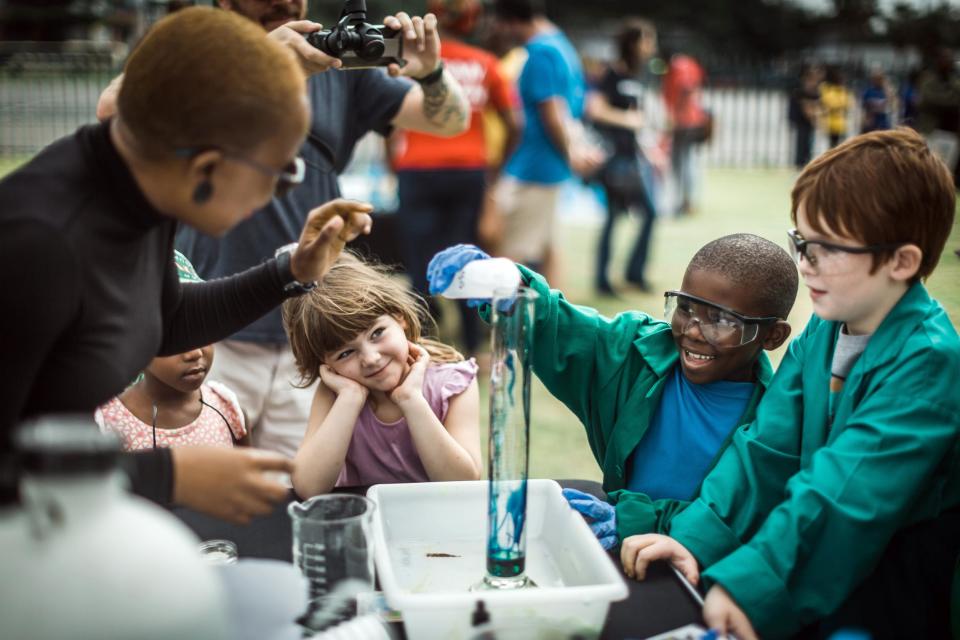 Children take part in an experiment called ‘Elephant Lips’ during the March for Science in Durban in 2018AFP/Getty