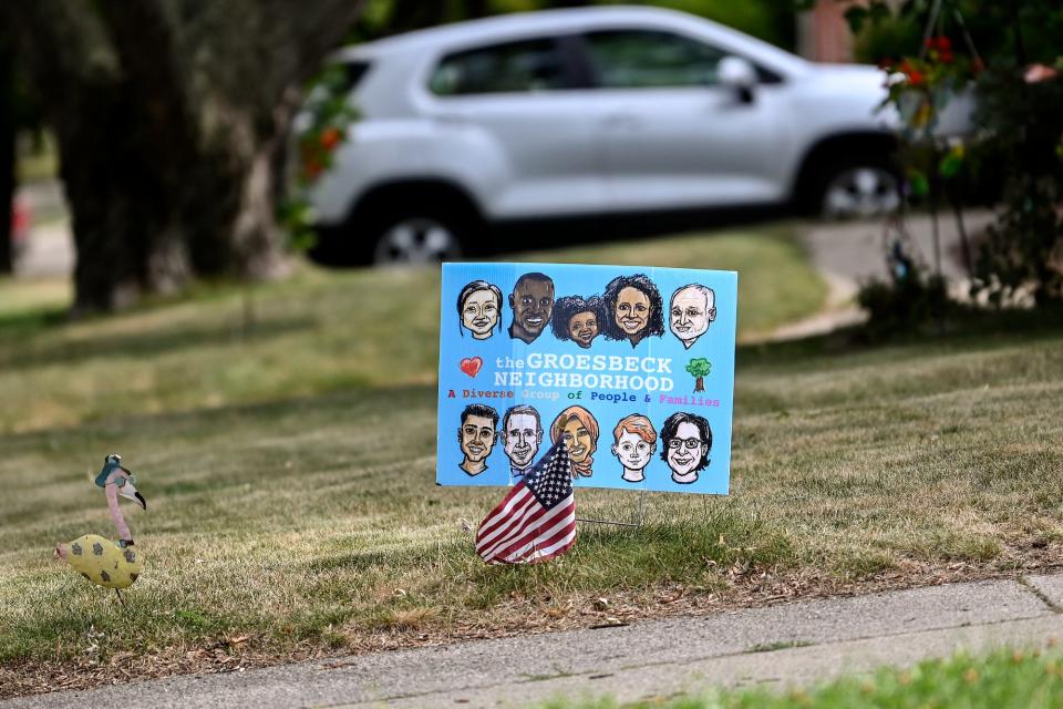 A sign for the Groesbeck Neighborhood is displayed in the yard of a home on Wednesday, Aug. 3, 2022, in Lansing.