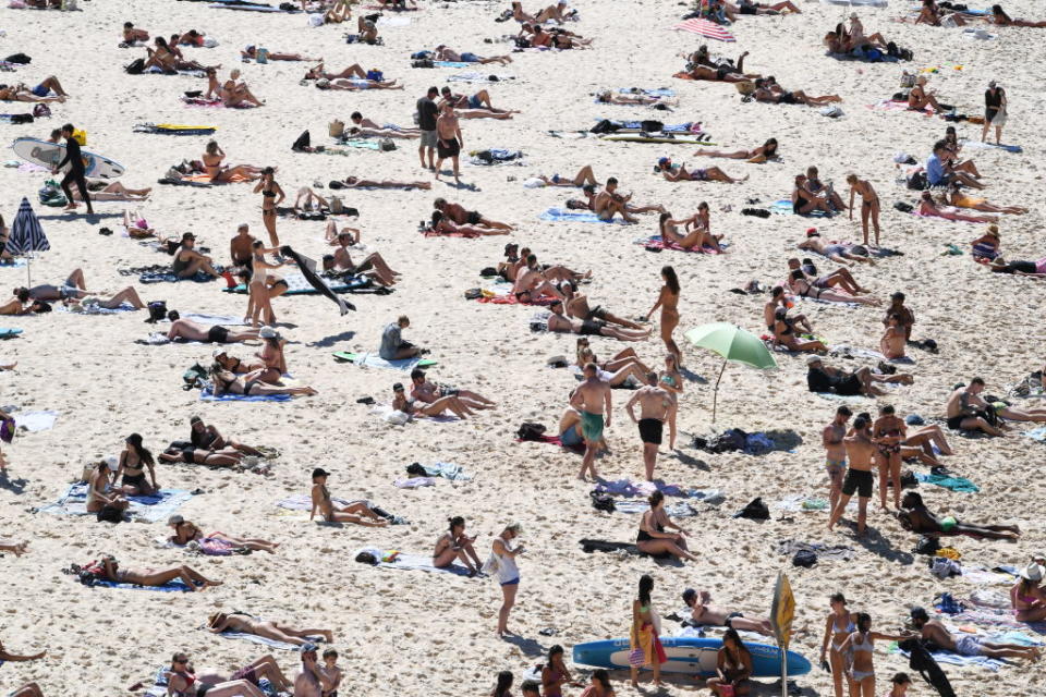 Sunbakers gather on Bondi Beach in Sydney, Australia. 