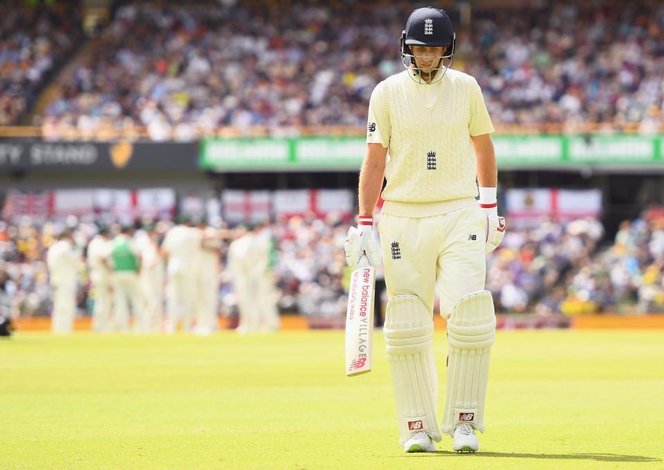 Joe Root walks off having edged Nathan Lyon to Steve Smith: Getty