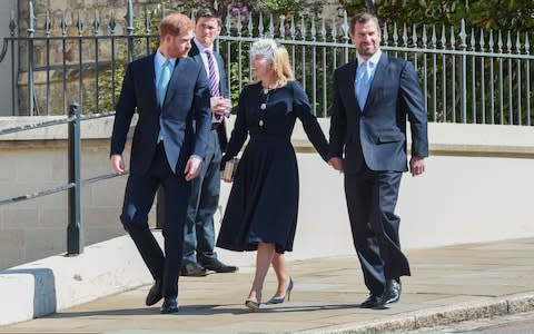 Prince Harry walks with Autumn and Peter Phillips - Credit: Getty