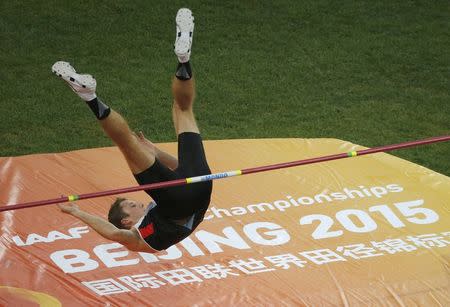 Derek Drouin of Canada competes in the men's high jump final during the 15th IAAF World Championships at the National Stadium in Beijing, China, August 30, 2015. REUTERS/Fabrizio Bensch