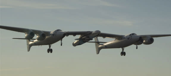 Virgin Galactic's LauncherOne suborbital rocket is carried by mothership WhiteKnightTwo. Image released July 10, 2012.