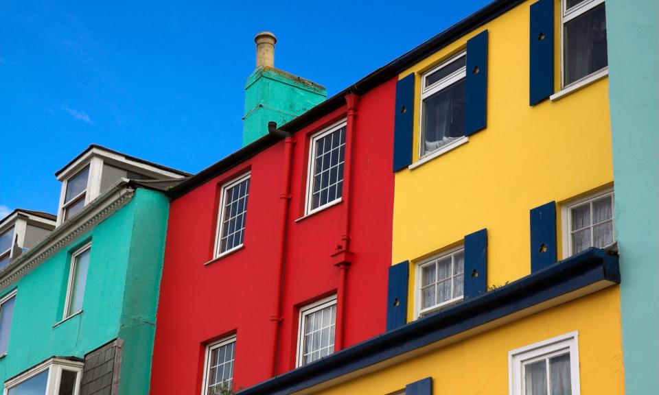 <span>Brightly painted cottages in Kingswear in Devon.</span><span>Photograph: ColsTravel/Alamy</span>