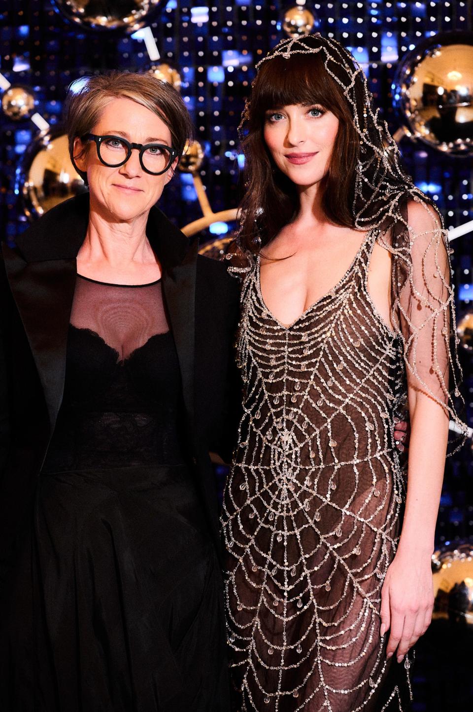 "Madame Web" director S.J. Clarkson (left) and star Dakota Johnson at the Baile da Vogue in Rio de Janeiro.