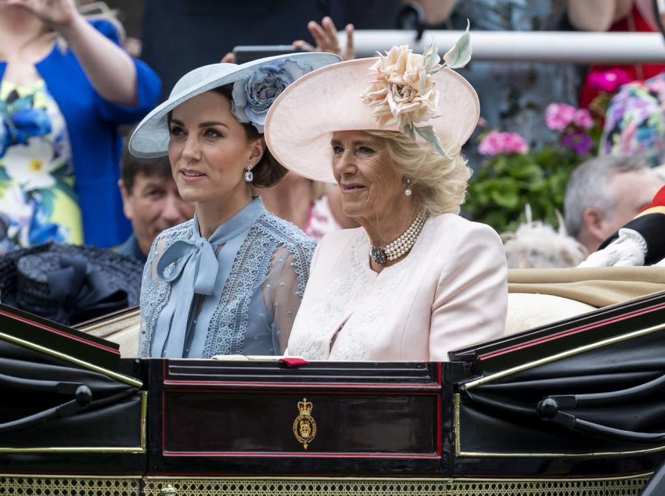 <p>For the first day of the 2019 Royal Ascot, Camilla opted for a soft pink ensemble. The jacket was embroidered with white florals and accented with one of her go-to jewelry pieces, the pearl and rose topaz choker. A matching blush hat with a floral accent completed the style. </p>