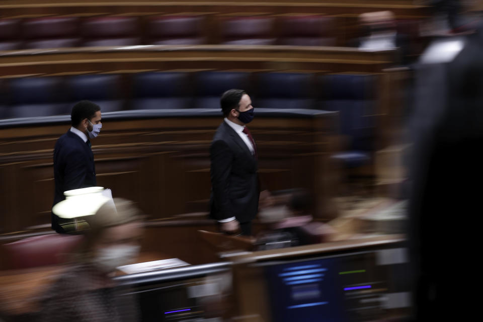 Vox party leader Santiago Abascal arrives for a parliamentary session in Madrid, Spain, Wednesday Oct. 21, 2020. Spanish Prime Minister Pedro Sanchez faces a no confidence vote in Parliament put forth by the far right opposition party VOX. (AP Photo/Manu Fernandez, Pool)