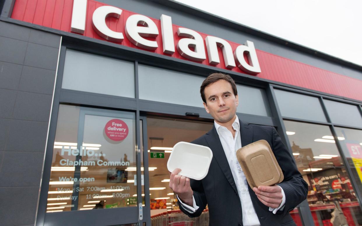 Iceland managing director, Richard Walker, with some non-plastic packaging, after they become the first major retailer to commit to eliminate plastic packaging  - PA