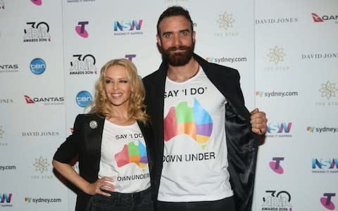 50 year old Kyle Minogue and her former fiancé, Joshua Sasse, who split two years ago - Credit: &nbsp;Cole Bennetts/Getty