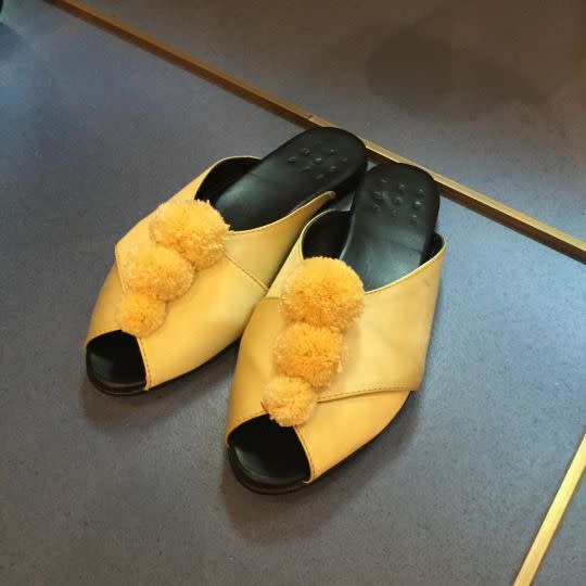 Trademark’s spring 2016 yellow pom pom slippers. 