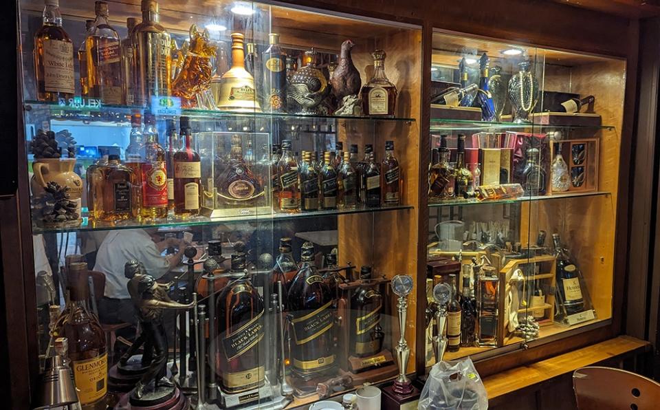 The whiskey cabinet: check out the dog bottle.