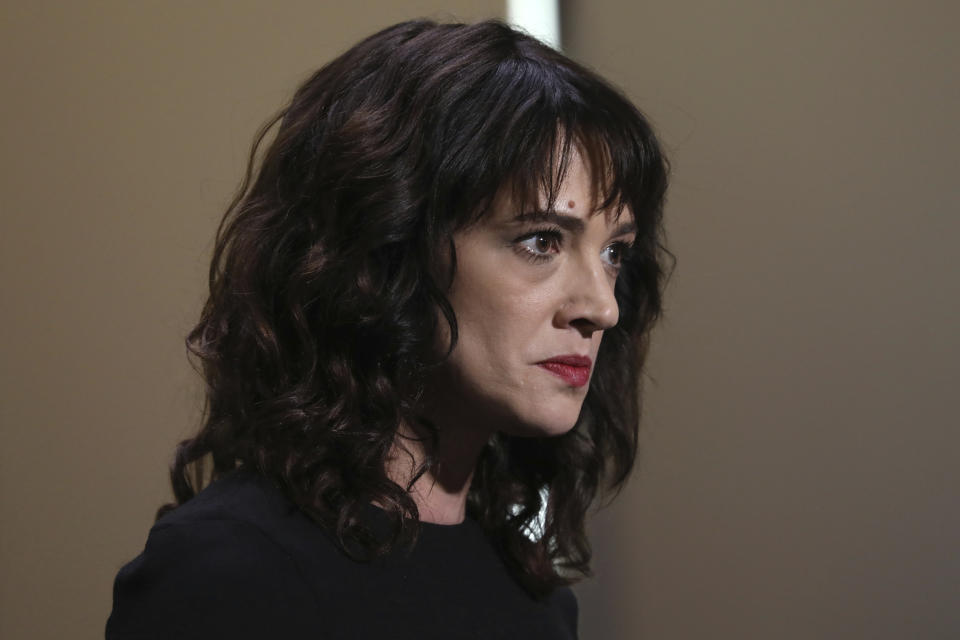 FILE - In this Saturday, May 19, 2018, file photo, actress Asia Argento speaks about being raped by Harvey Weinstein during the closing ceremony of the 71st international film festival, Cannes, southern France. The New York Times reports that Argento, one of the most prominent activists of the #MeToo movement, recently settled a lawsuit filed against her by a young actor and musician who said she sexually assaulted him when he was 17. (Photo by Vianney Le Caer/Invision/AP, File)